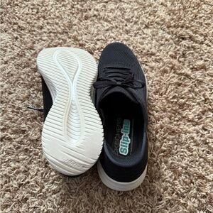 Skechers Black and White Slip-On Shoes